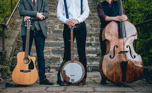 Trio,Of,Musicians,With,A,Guitar,,Banjo,And,Contrabass